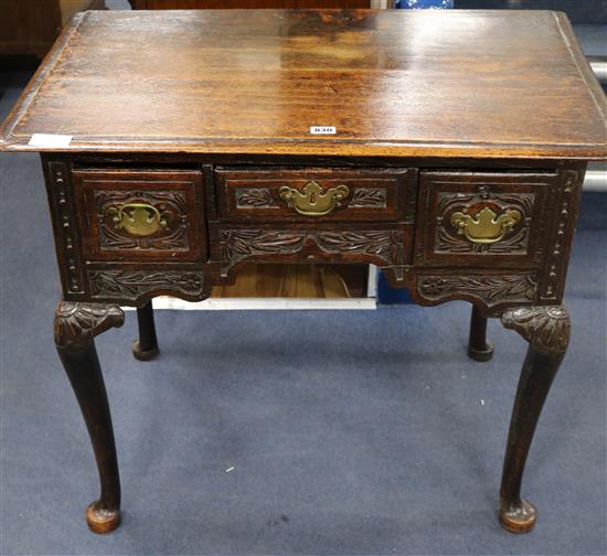 A Georgian oak lowboy W.81cm